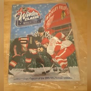2009 Wrigley Field official Winter Classic program. New in plastic.